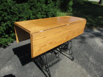 Table with fold down leaves,  Singer base