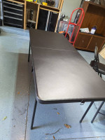 6ft folding table and 6 padded folding chairs