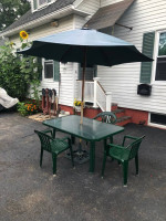 Patio table and 3 chairs with umbrella