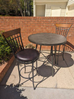 Cute counter-height cafe table and faux leather stool-chairs
