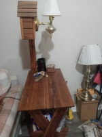 Solid oak end table with light and magazine basket