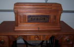 1889 New Home Cast Iron Treadle Sewing Machine Walnut Coffin Top Table