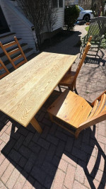 Solid wood table with IKEA chairs