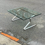 chrome & glass coffee table in the style of oliver mourgue