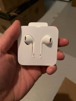 airpods, apple charging cable, apple headphones