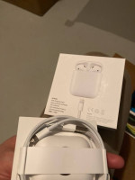 airpods, apple charging cable, apple headphones