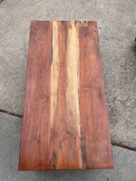 Leather couches and wood coffee table