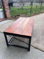 Leather couches and wood coffee table