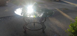 Circular Glass Table on a Bronze Base