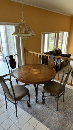Furniture: one round breakfast table with 4 chairs
