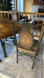 Furniture: one round breakfast table with 4 chairs