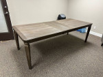 Grey wood table with extendable leaf