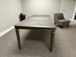 Grey wood table with extendable leaf