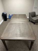 Grey wood table with extendable leaf