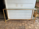 Gold, glass top console table