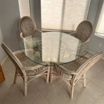 Rattan Glass top wood table and four chairs