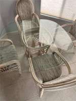 Rattan Glass top wood table and four chairs