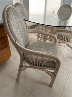 Rattan Glass top wood table and four chairs
