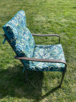 Patio table, six chairs and rug
