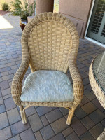 Round Rattan 48" Patio table and four padded chairs