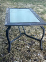 Outdoor table with glass top