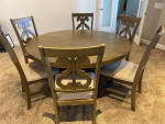 Natural wood grain finish 60" round dining table with six chairs