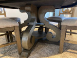 Natural wood grain finish 60" round dining table with six chairs