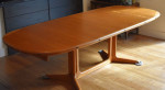 Newly-restored "boat-shaped" Danish expandable teak dining table