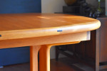 Newly-restored "boat-shaped" Danish expandable teak dining table