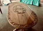 Hand Carved Oval Table with custom class top.