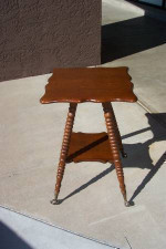 Parlor table with ball and claw