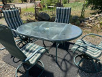 Green Metal Patio Table with Glass Top and 4 Chairs