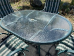 Green Metal Patio Table with Glass Top and 4 Chairs