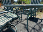 Green Metal Patio Table with Glass Top and 4 Chairs