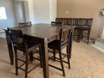 Expandable dining table with 8 chairs