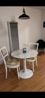 Cafe style table. Lightweight. Not marble.