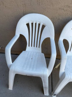 Two outdoor plastic chairs and one table. No cracks, just some paint spots. $10