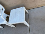 Two outdoor plastic chairs and one table. No cracks, just some paint spots. $10