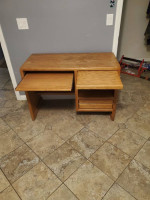 Wood desk with retractable table