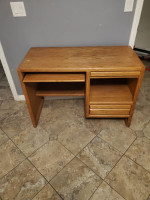 Wood desk with retractable table
