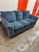 SOFA, VELVET UPHOLSTERY , BEAUTIFUL BLUE COLOR, NEW IN PLASTIC.
