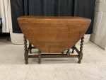 Tiger oak drop leaf table