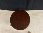 Stained wood round side table