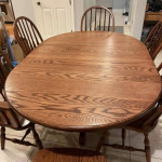 Table 48 inch Round Solid Red Oak with two 12 inch leaves & 4 Chairs