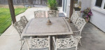 Patio table with 8 chairs / 2 matching lounges on wheels