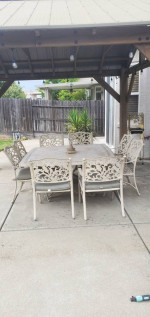 Patio table with 8 chairs / 2 matching lounges on wheels