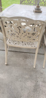 Patio table with 8 chairs / 2 matching lounges on wheels