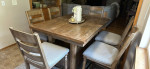 Counter height table with six chairs