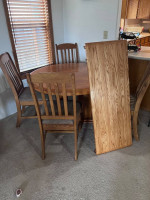 Solid oak table and chairs