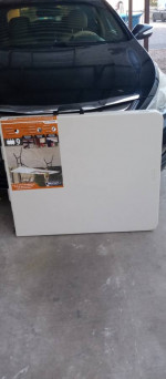 Table plus 4 chairs (fold up)